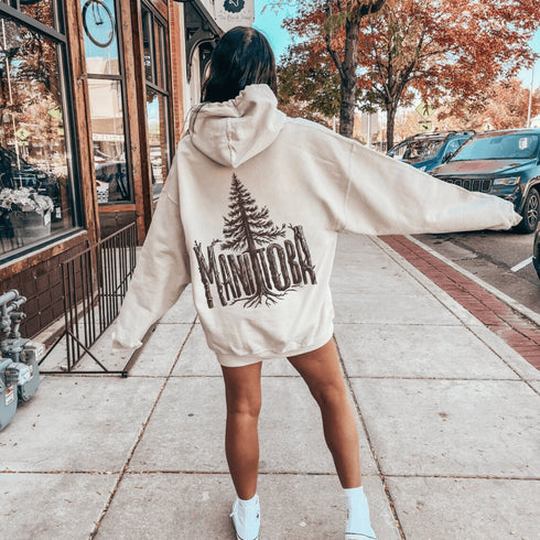 Show your love for Manitoba’s natural beauty with this cozy and stylish hoodie featuring “Manitoba” in a beautifully crafted tree branch font.